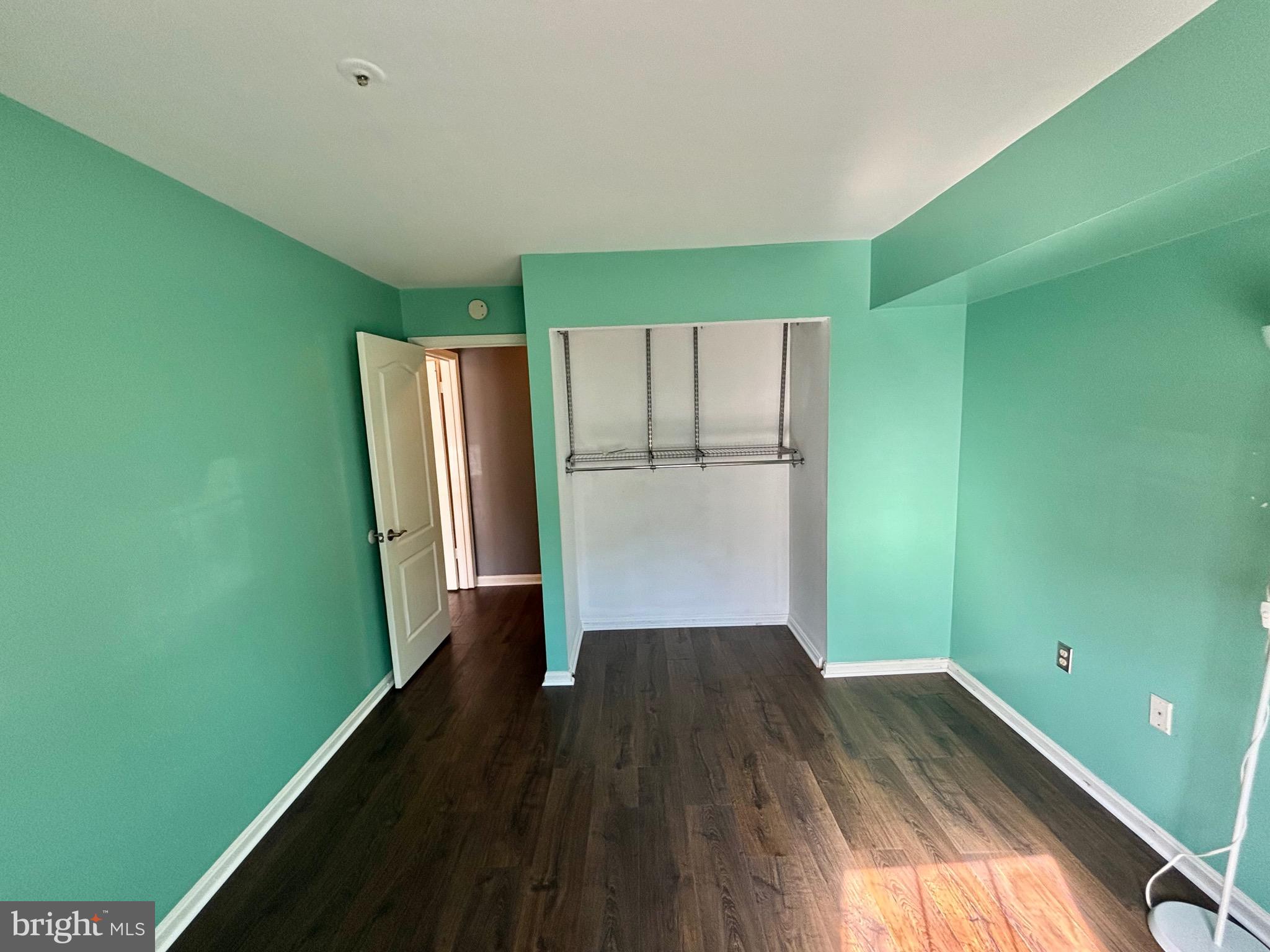 8513 Falls Run Road, Unit A Ellicott City, MD 21043 - Photo 23 of 39 a view of a room with wooden floor