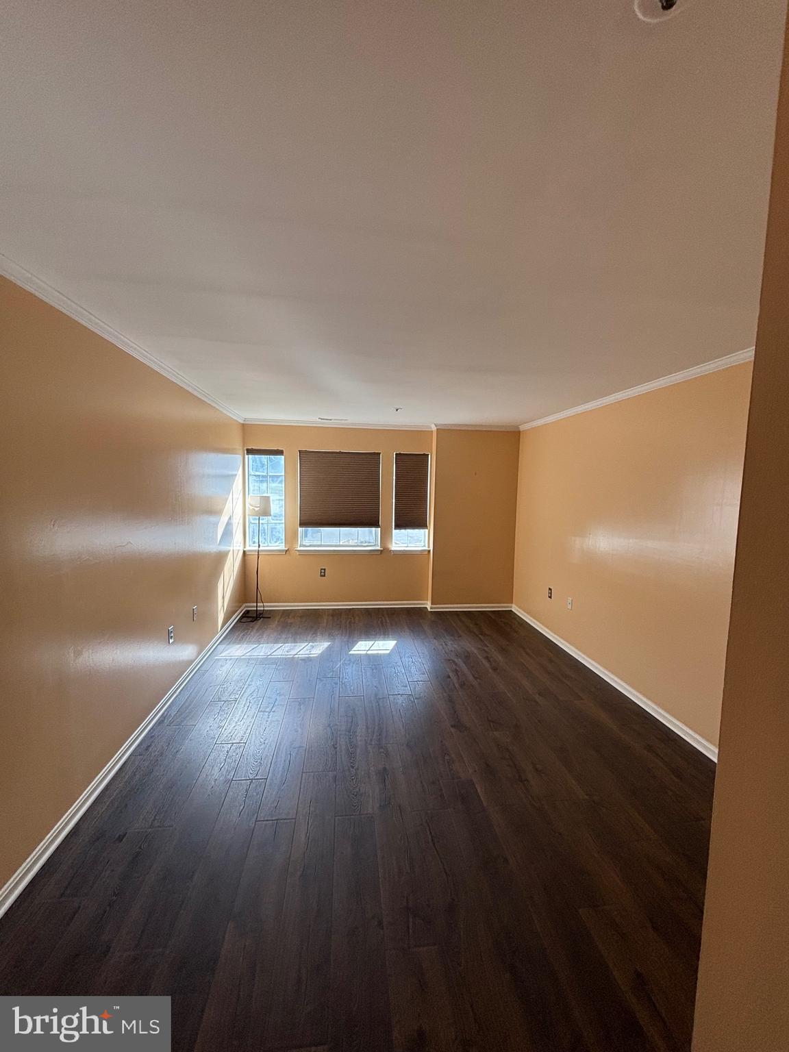 8513 Falls Run Road, Unit A Ellicott City, MD 21043 - Photo 27 of 39 a view of empty room with wooden floor