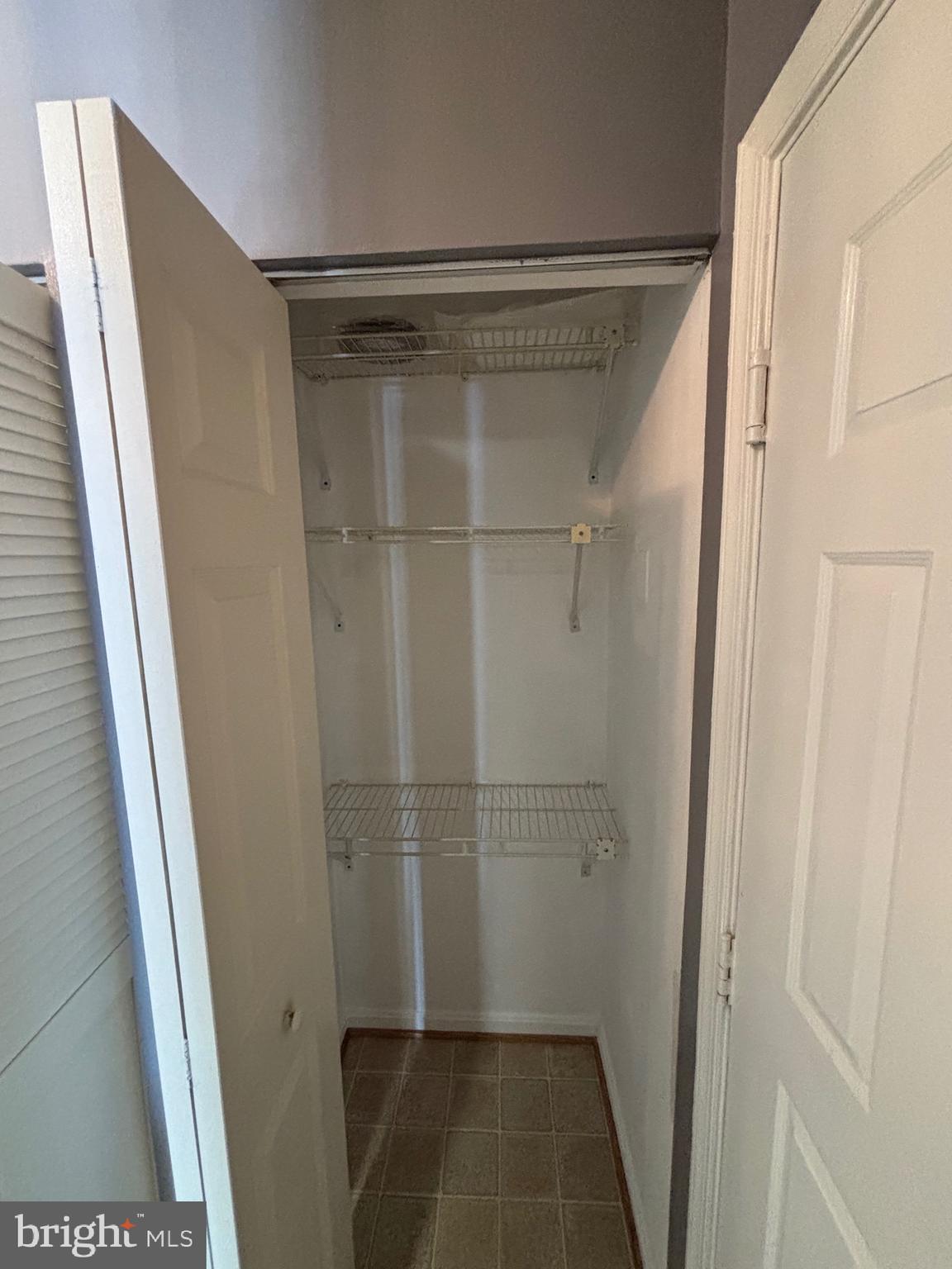 8513 Falls Run Road, Unit A Ellicott City, MD 21043 - Photo 3 of 39 a view of closet