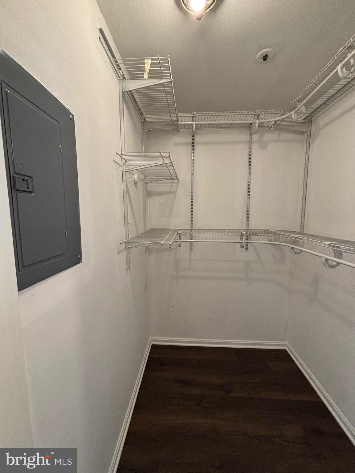 8513 Falls Run Road, Unit A Ellicott City, MD 21043 - Photo 35 of 39 a view of walk in closet with empty racks