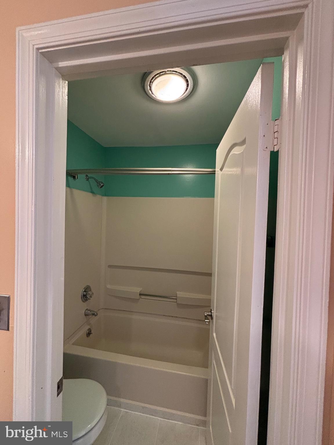 8513 Falls Run Road, Unit A Ellicott City, MD 21043 - Photo 38 of 39 a bathroom with a toilet and a shower