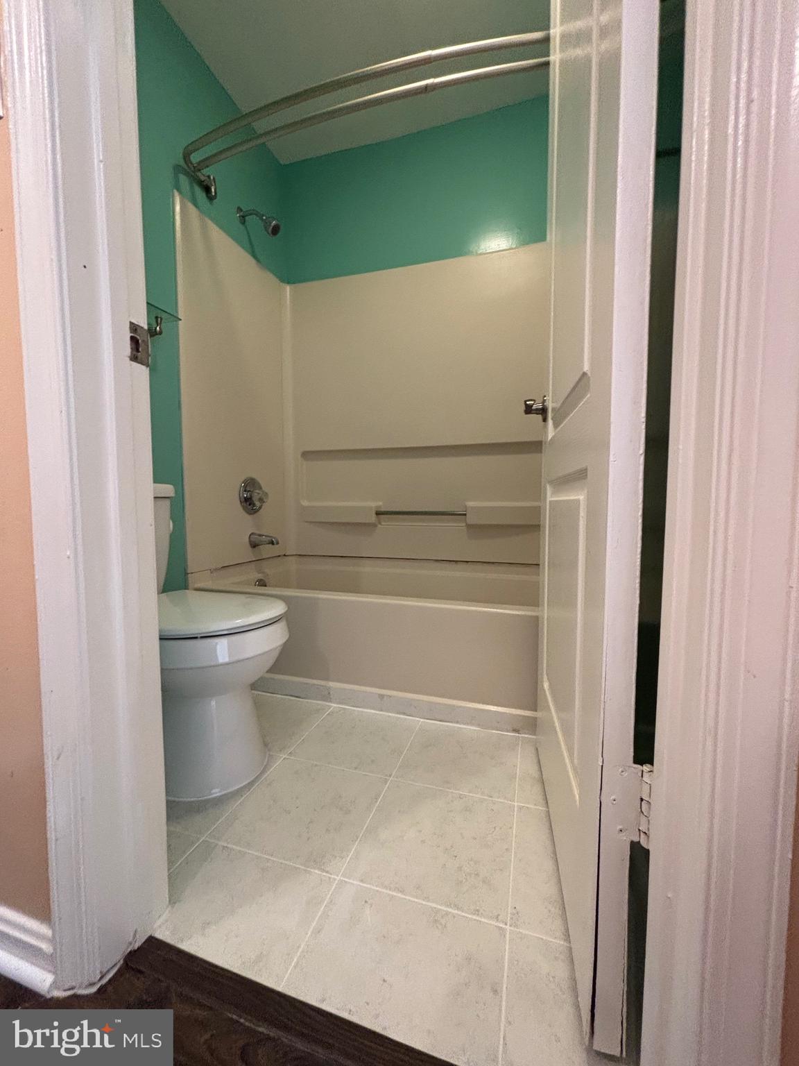 8513 Falls Run Road, Unit A Ellicott City, MD 21043 - Photo 39 of 39 a bathroom with a toilet and a shower