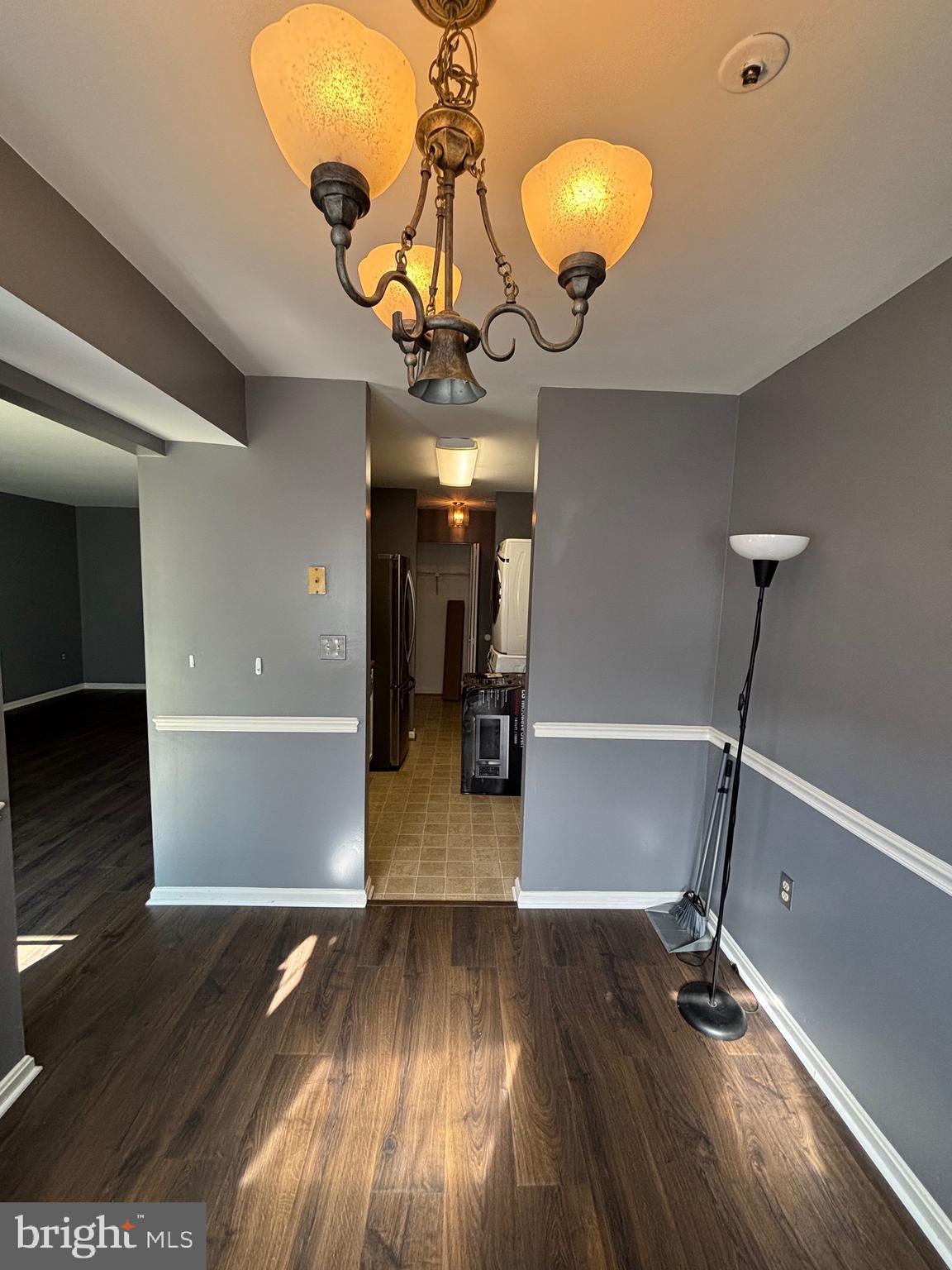 8513 Falls Run Road, Unit A Ellicott City, MD 21043 - Photo 8 of 39 a view of a room with wooden floor