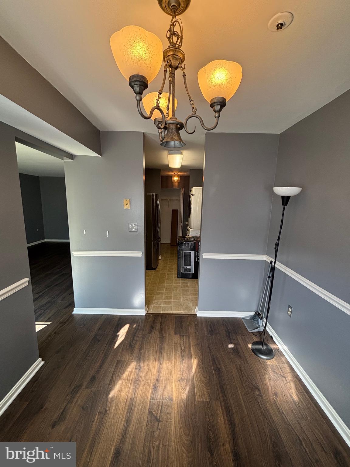 8513 Falls Run Road, Unit A Ellicott City, MD 21043 - Photo 9 of 39 a view of a room with wooden floor