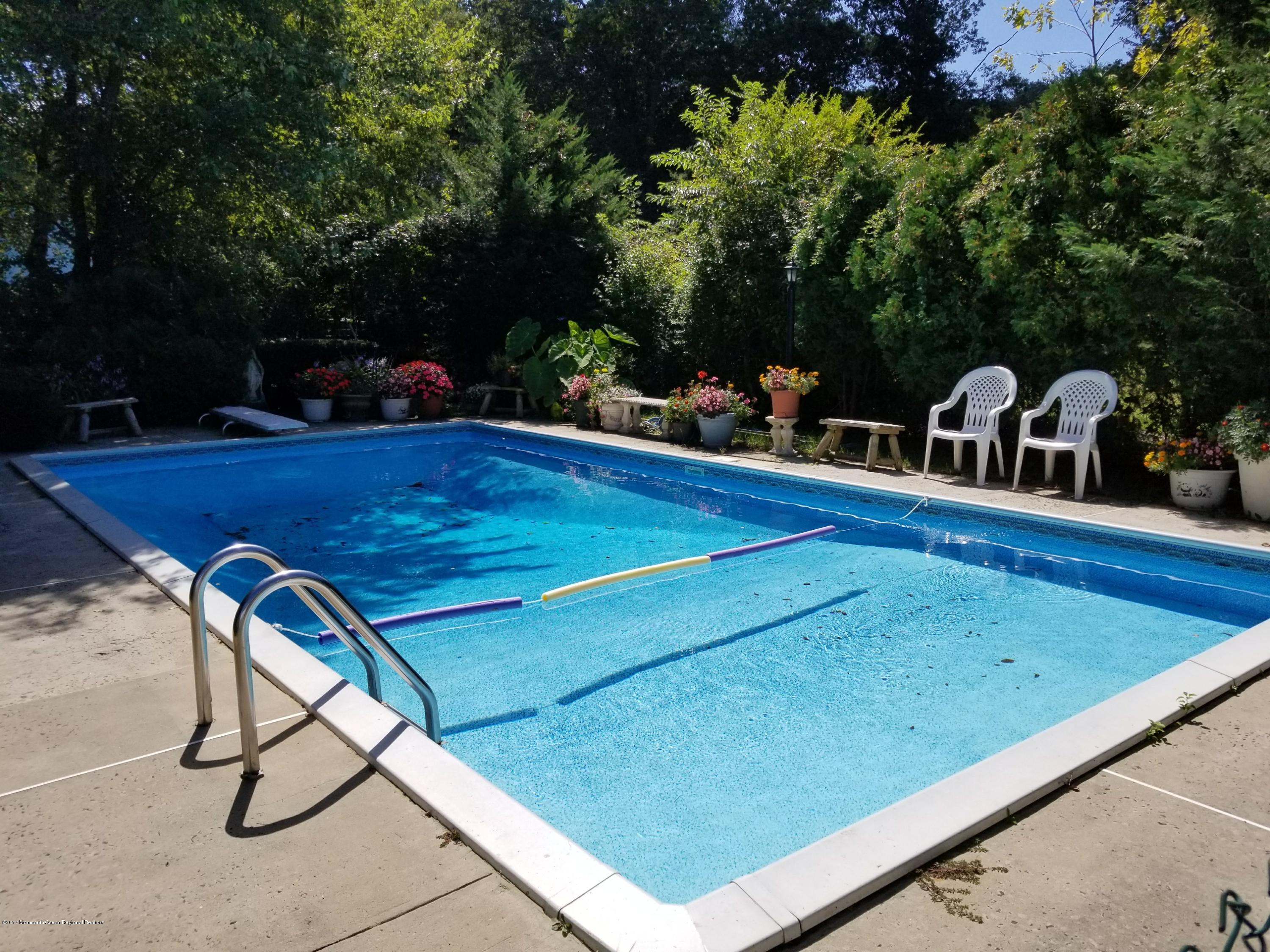 1093 Larsen Road Jackson, NJ 08527 - Photo 29 of 36 a view of swimming pool from a balcony