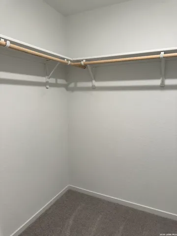 a view of a room with racks on the wall