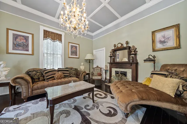 a view of a livingroom with furniture and a fireplace