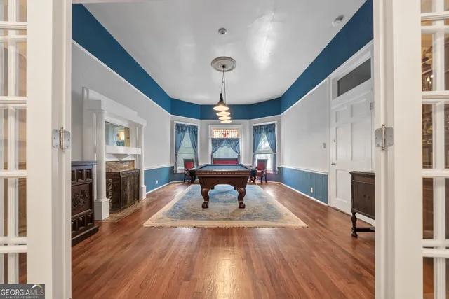 a view of front door and potted plants