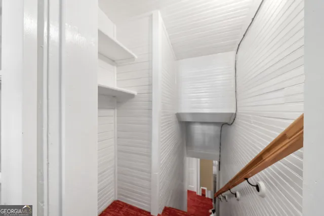 a view of a house with a iron gate