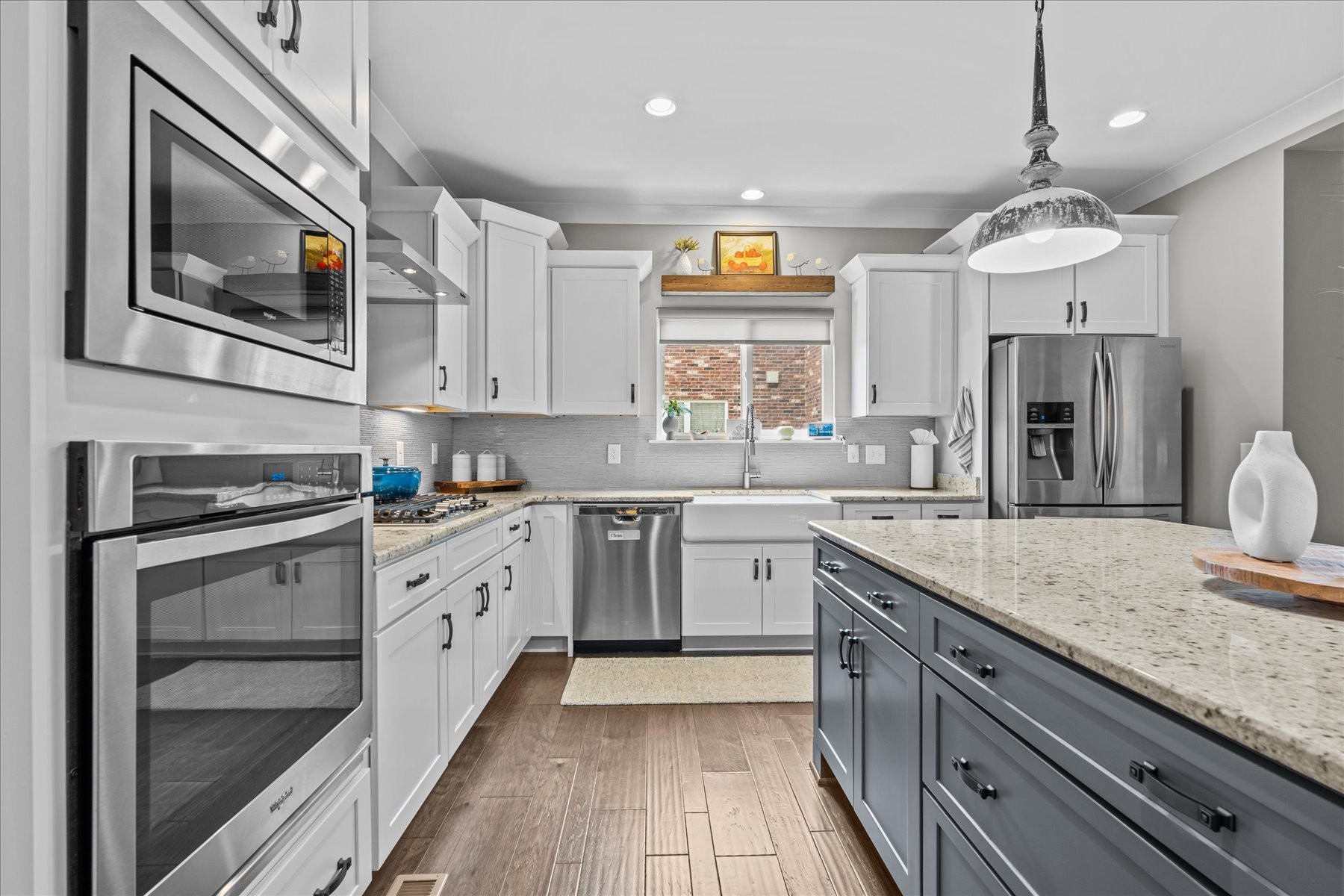 766 Beamon Drive Franklin, TN 37064 - Photo 11 of 39 a kitchen with a sink stove and microwave