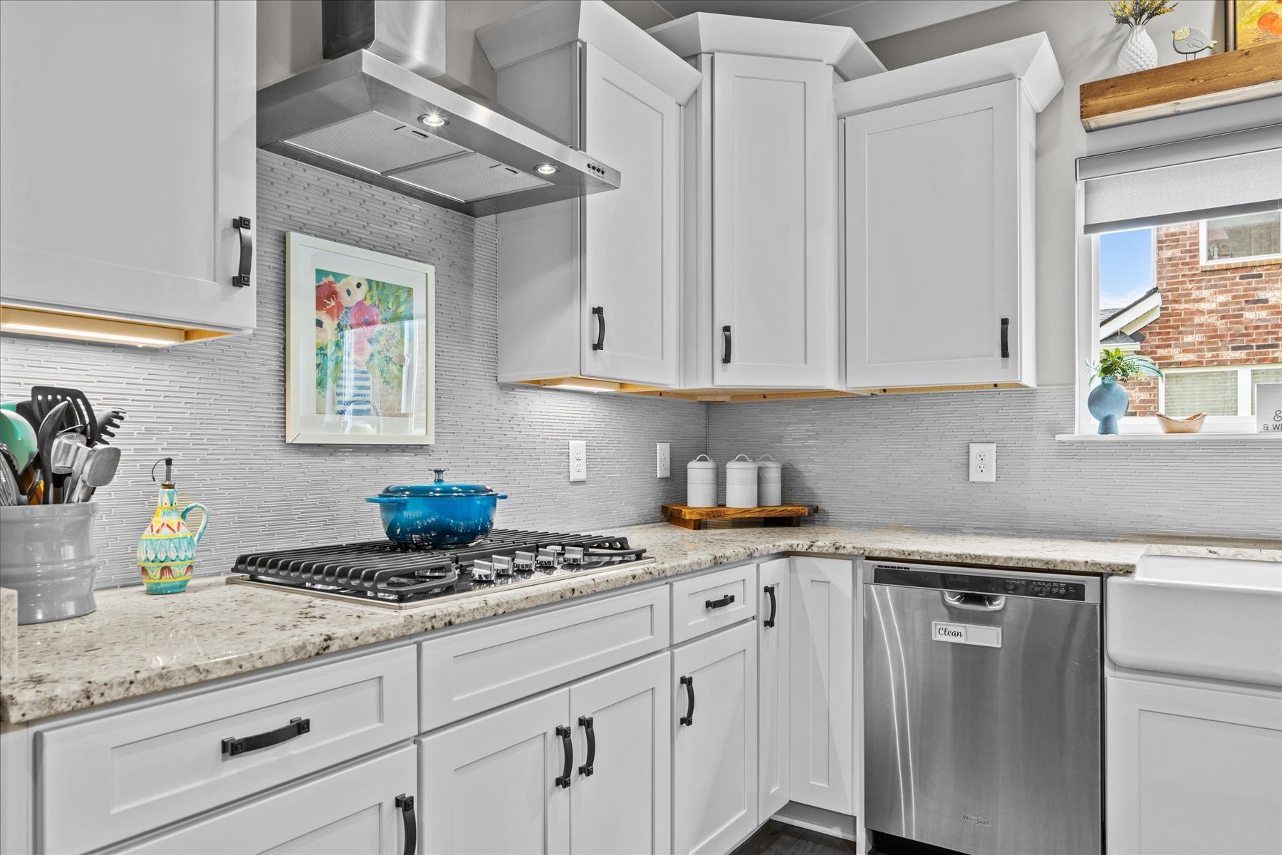 766 Beamon Drive Franklin, TN 37064 - Photo 12 of 39 a kitchen with stainless steel appliances granite countertop a sink a stove and cabinets