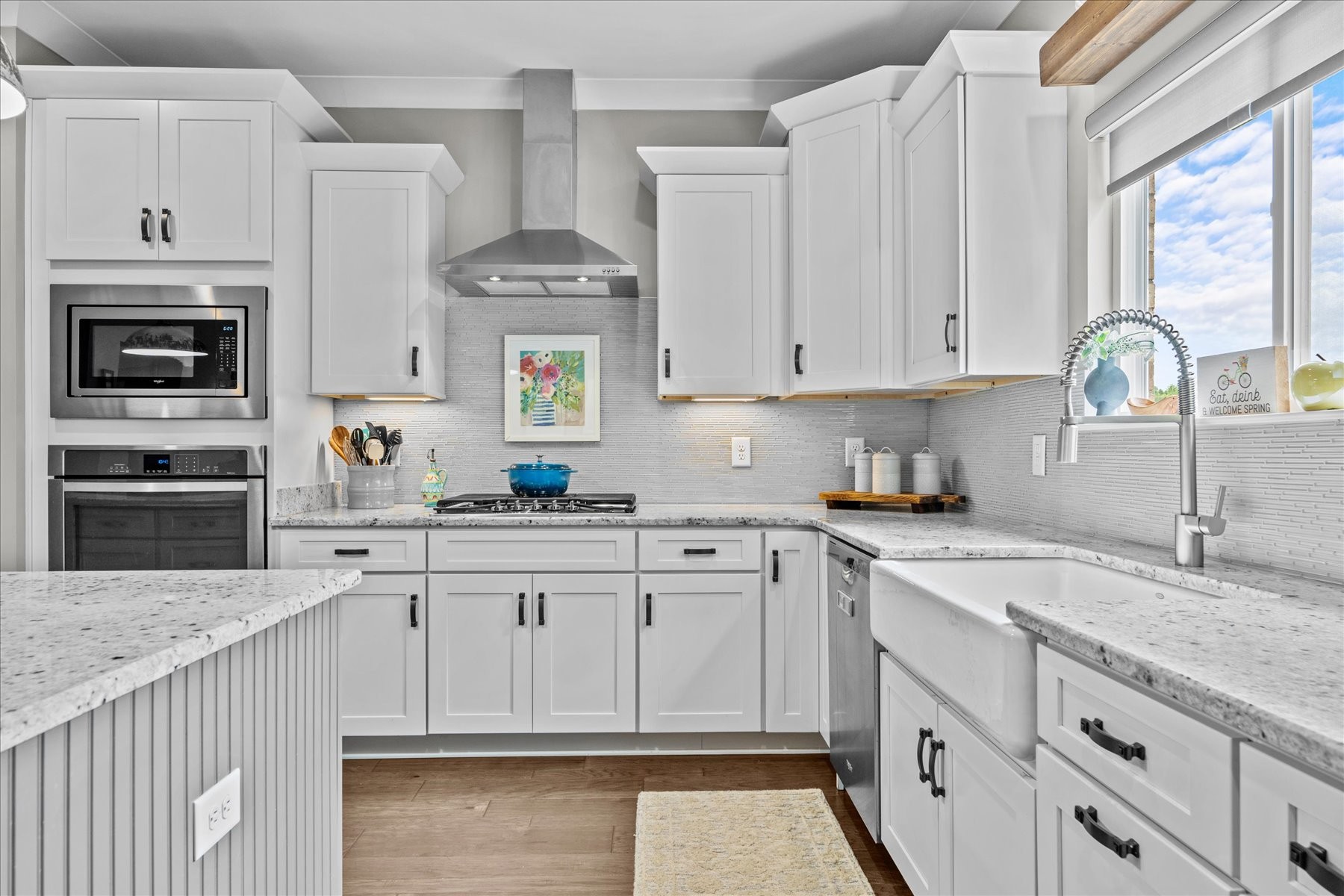 766 Beamon Drive Franklin, TN 37064 - Photo 14 of 39 a kitchen with granite countertop a sink stainless steel appliances and white cabinets