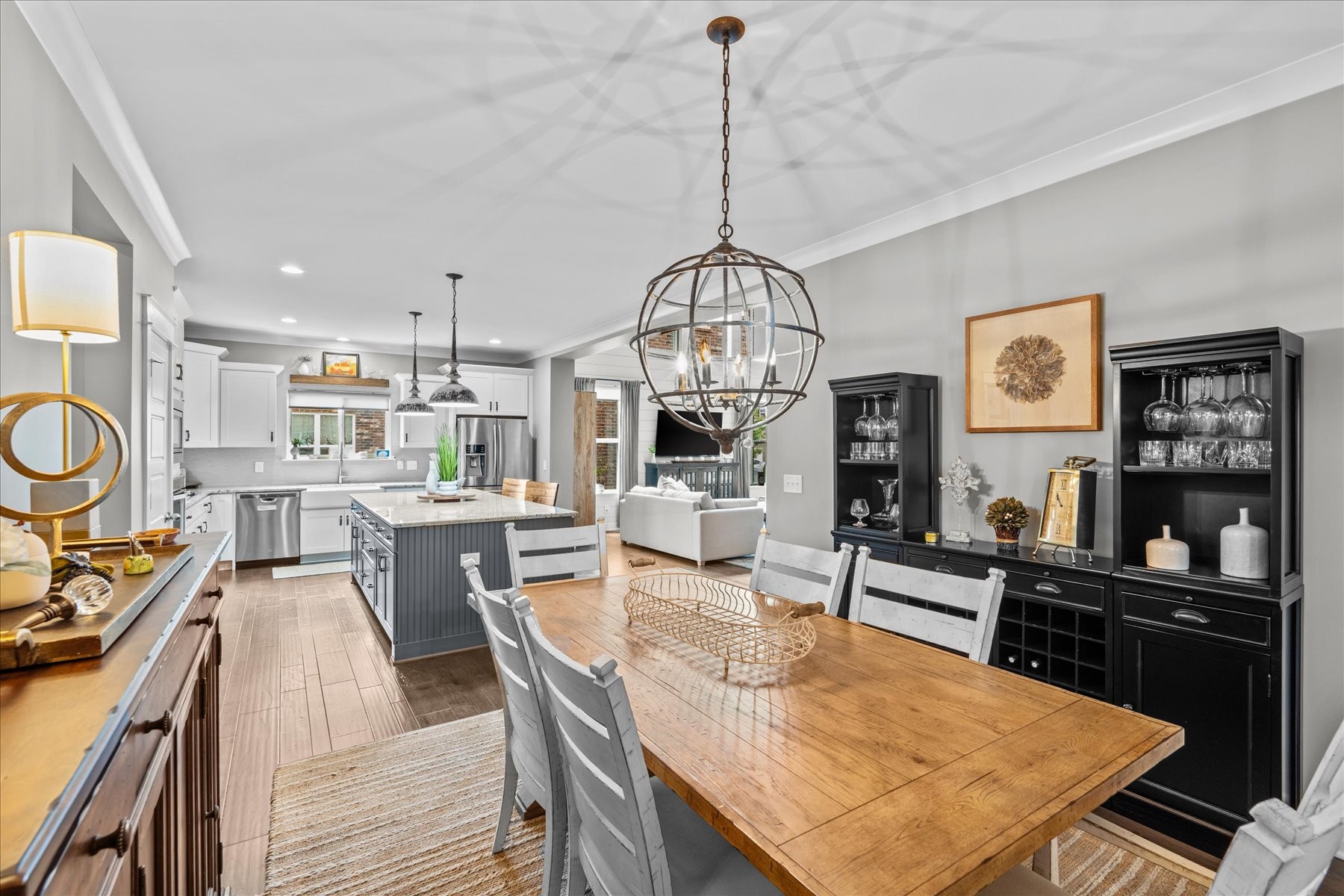 766 Beamon Drive Franklin, TN 37064 - Photo 16 of 39 a view of a dining room with furniture a kitchen and chandelier