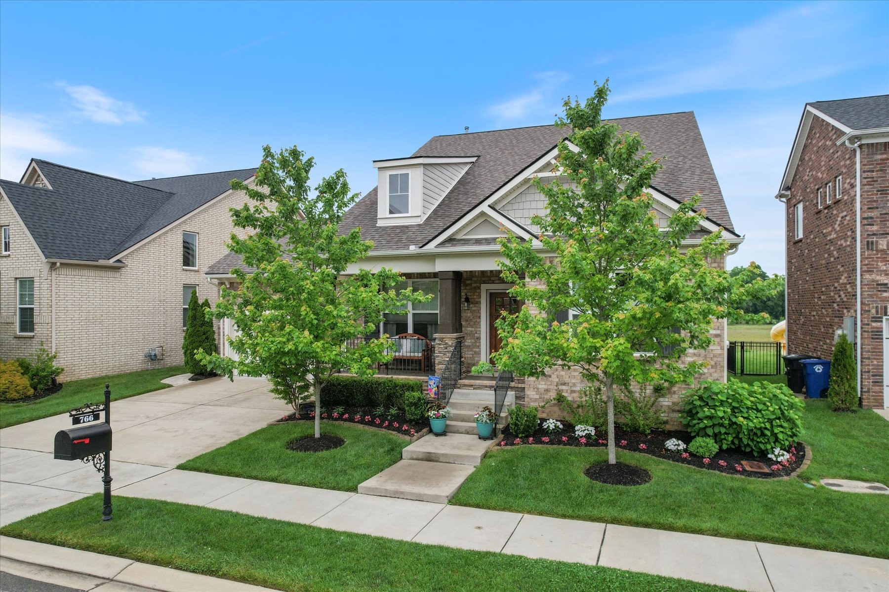 766 Beamon Drive Franklin, TN 37064 - Photo 2 of 39 a front view of a house with a yard