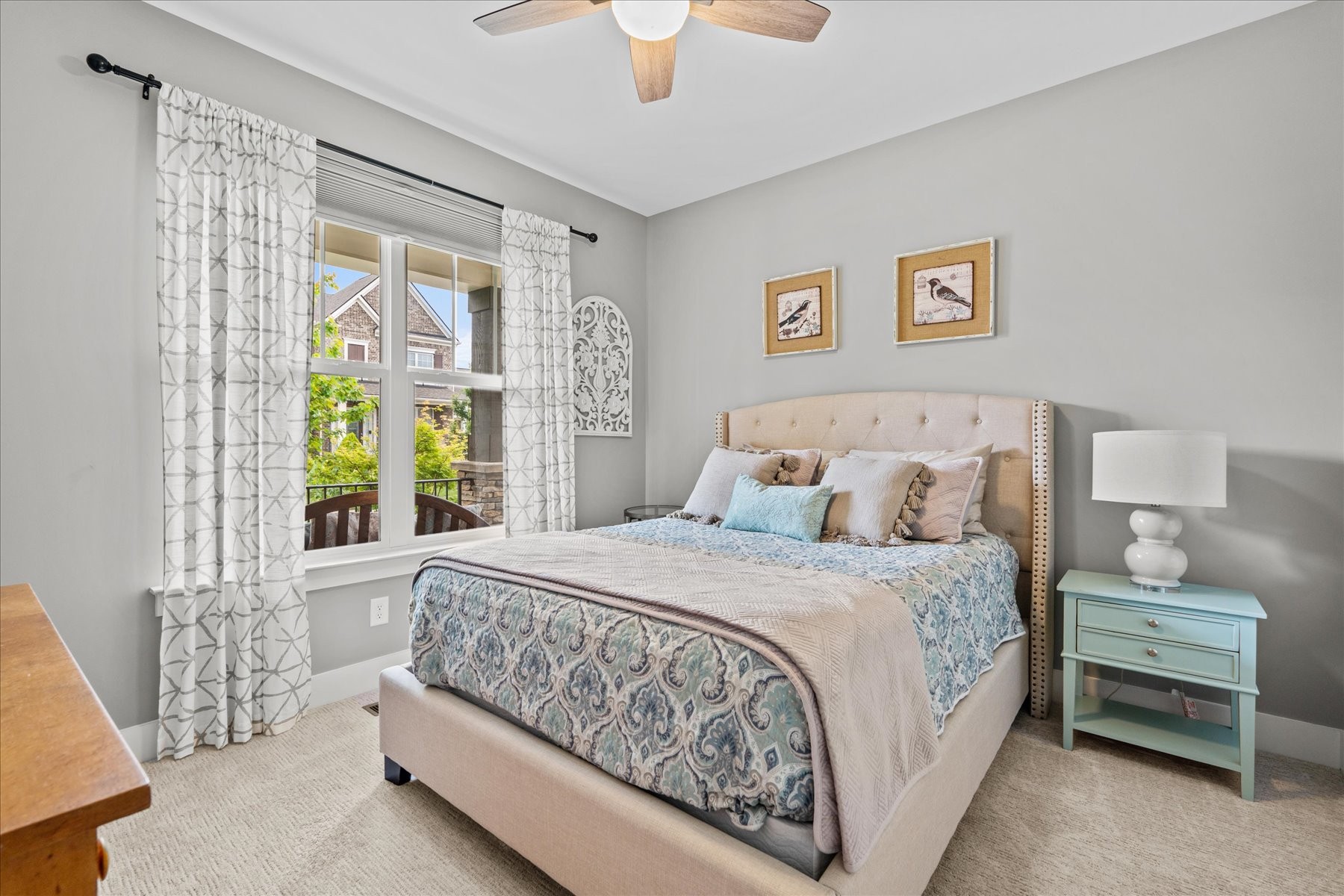 766 Beamon Drive Franklin, TN 37064 - Photo 28 of 39 a bedroom with a large bed and a chandelier