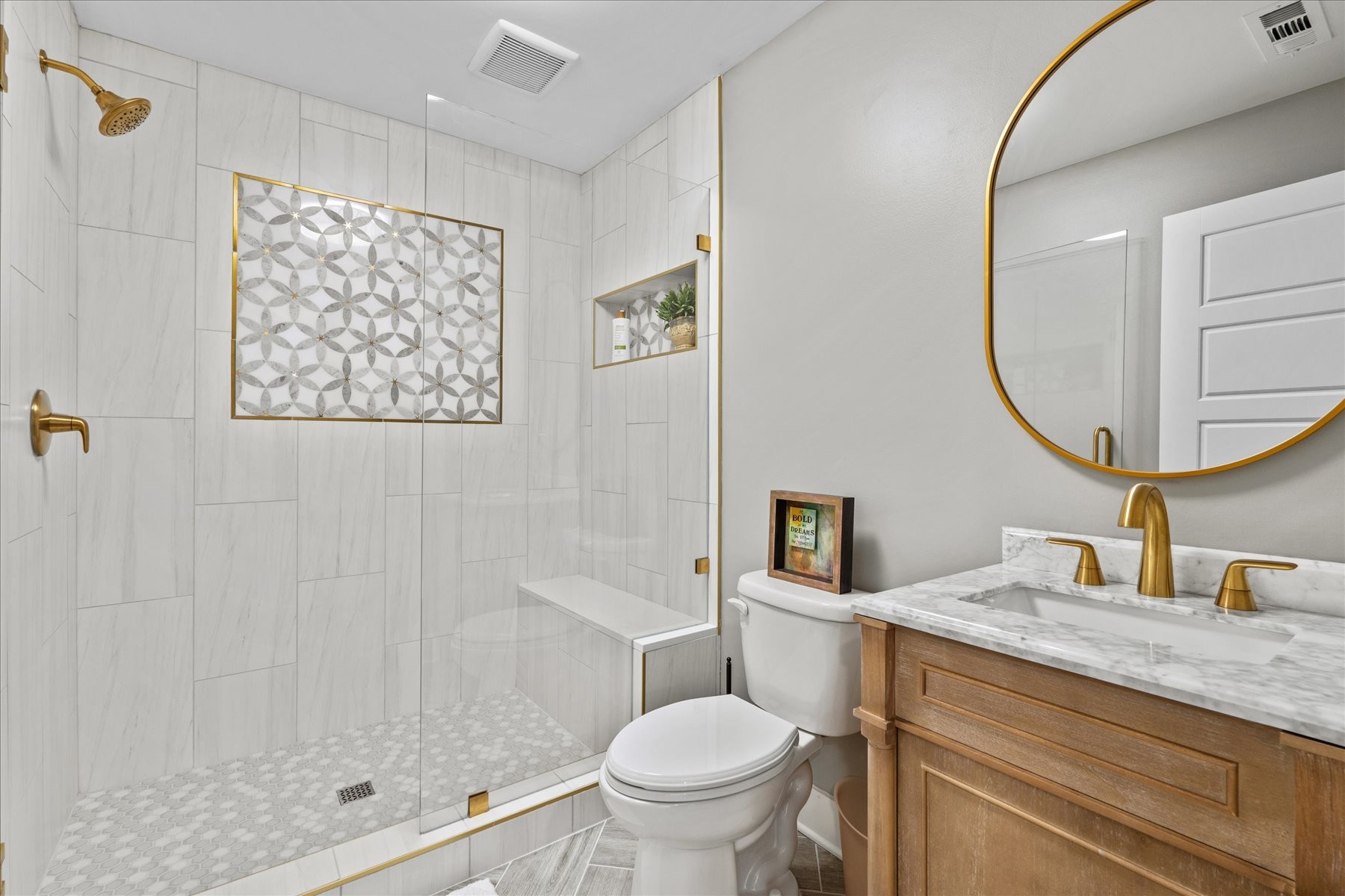 766 Beamon Drive Franklin, TN 37064 - Photo 31 of 39 a bathroom with a granite countertop sink toilet and a mirror