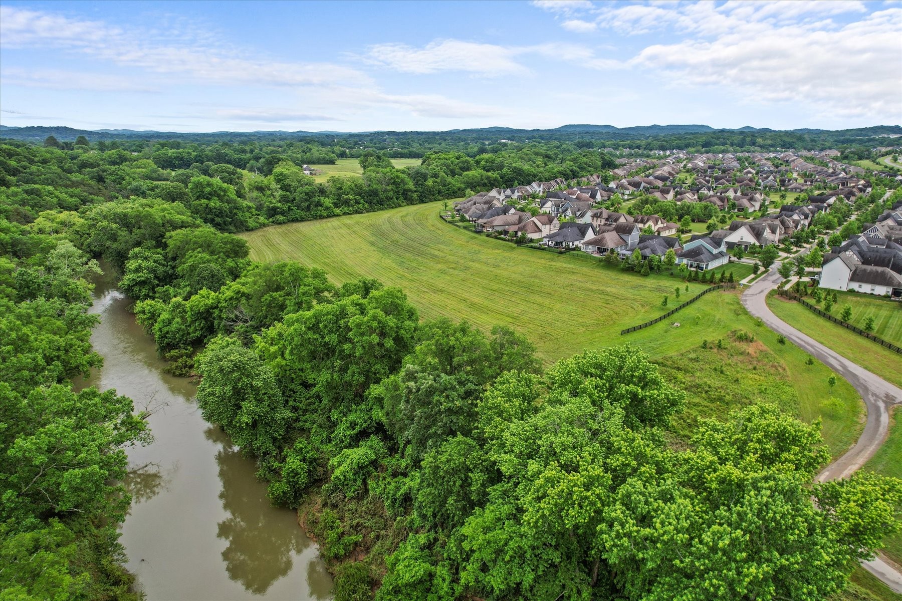766 Beamon Drive Franklin, TN 37064 - Photo 34 of 39 a view of a lake with a city