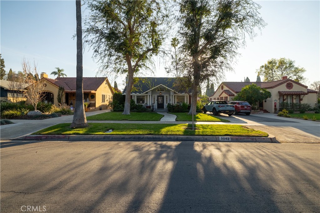 3642 Larchwood Place Riverside, CA 92506 - Photo 2 of 35 a view of swimming pool with lawn chairs and plants