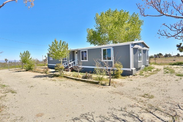 3362 Del Rosa Road Phelan, CA 92371 - Photo 1 of 1 a view of back yard of the house