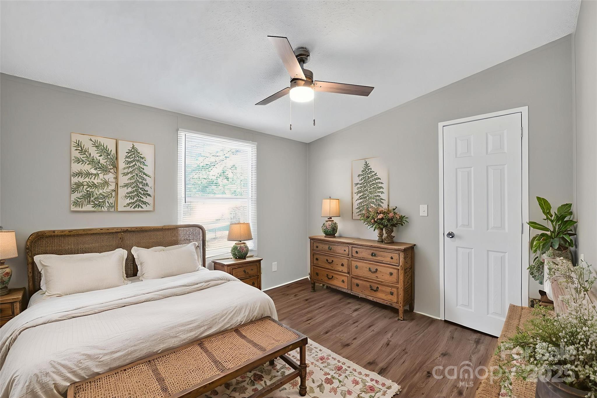 3802 Hickory Grove Road Mount Holly, NC 28120 - Photo 7 of 15 a bedroom with a bed and a window