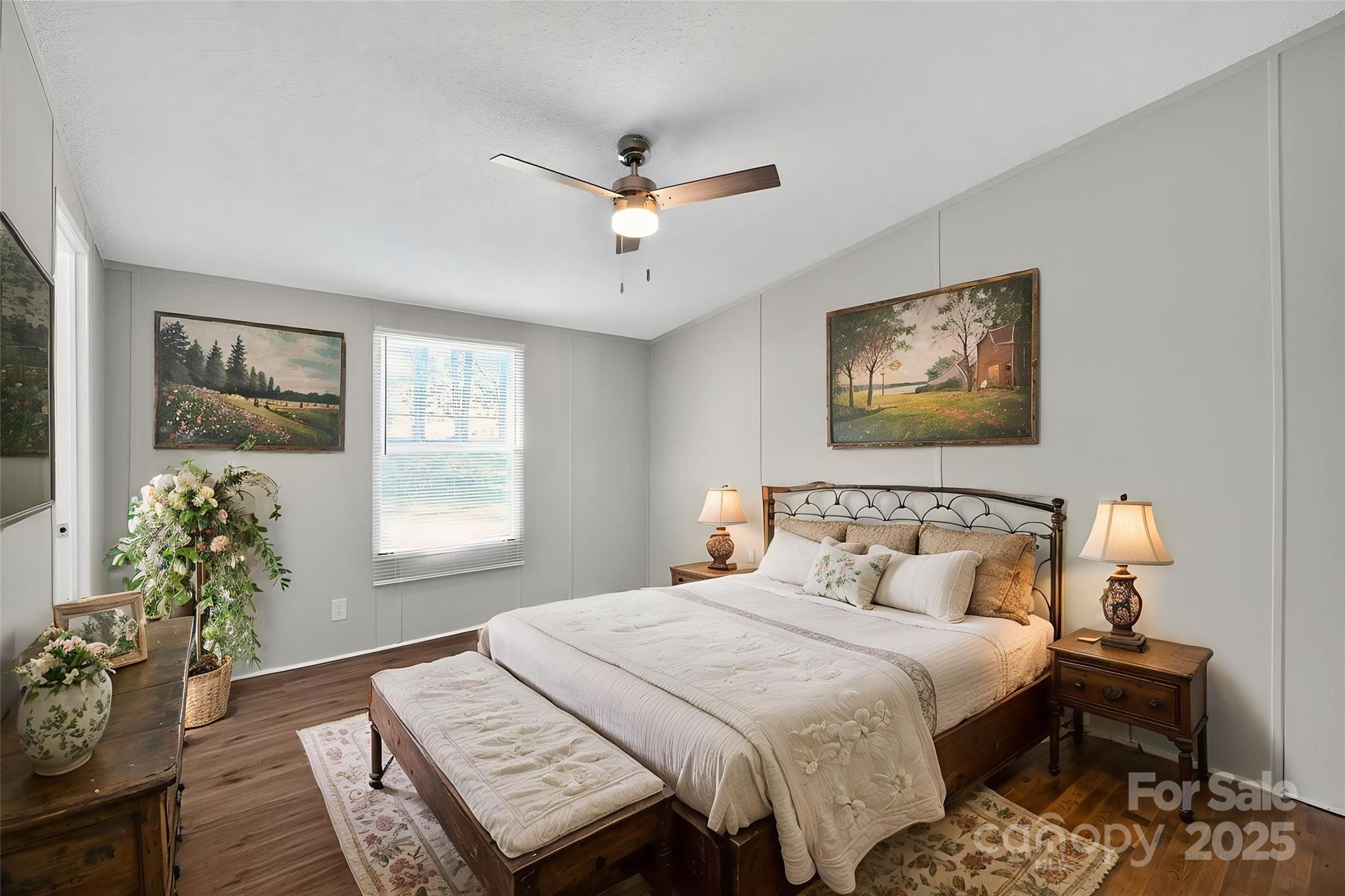 3802 Hickory Grove Road Mount Holly, NC 28120 - Photo 8 of 15 a bedroom with bed and wooden floor