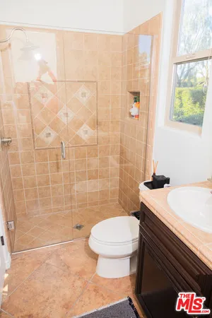 a view of small space with racks on the wall