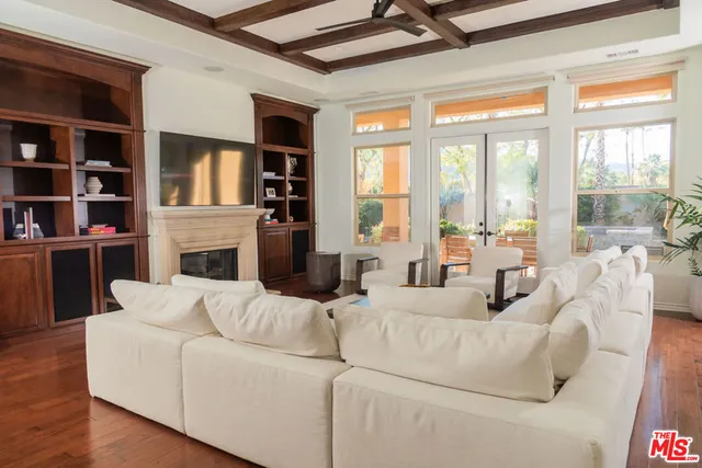 a living room with furniture or fireplace and a large window