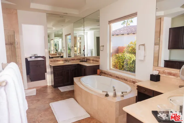 a view of a workspace with furniture