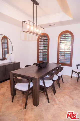 a view of a yard with large trees