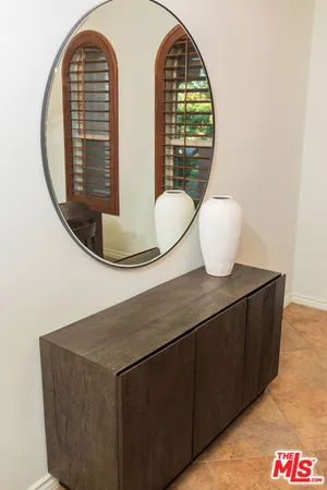 a view of a tree in front of a house