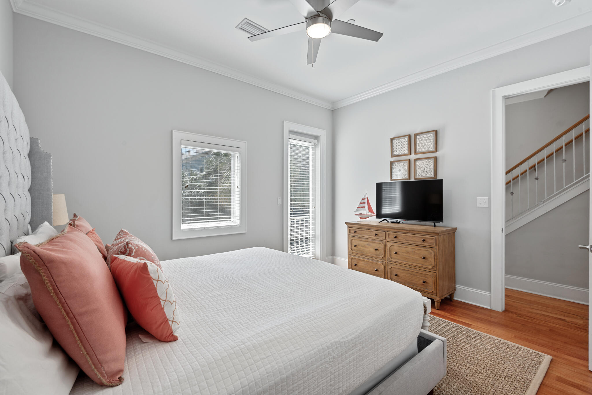 29 Coastal Grove Way, Unit 2 Santa Rosa Beach, FL 32459 - Photo 17 of 56 a bedroom with a bed and a flat screen tv