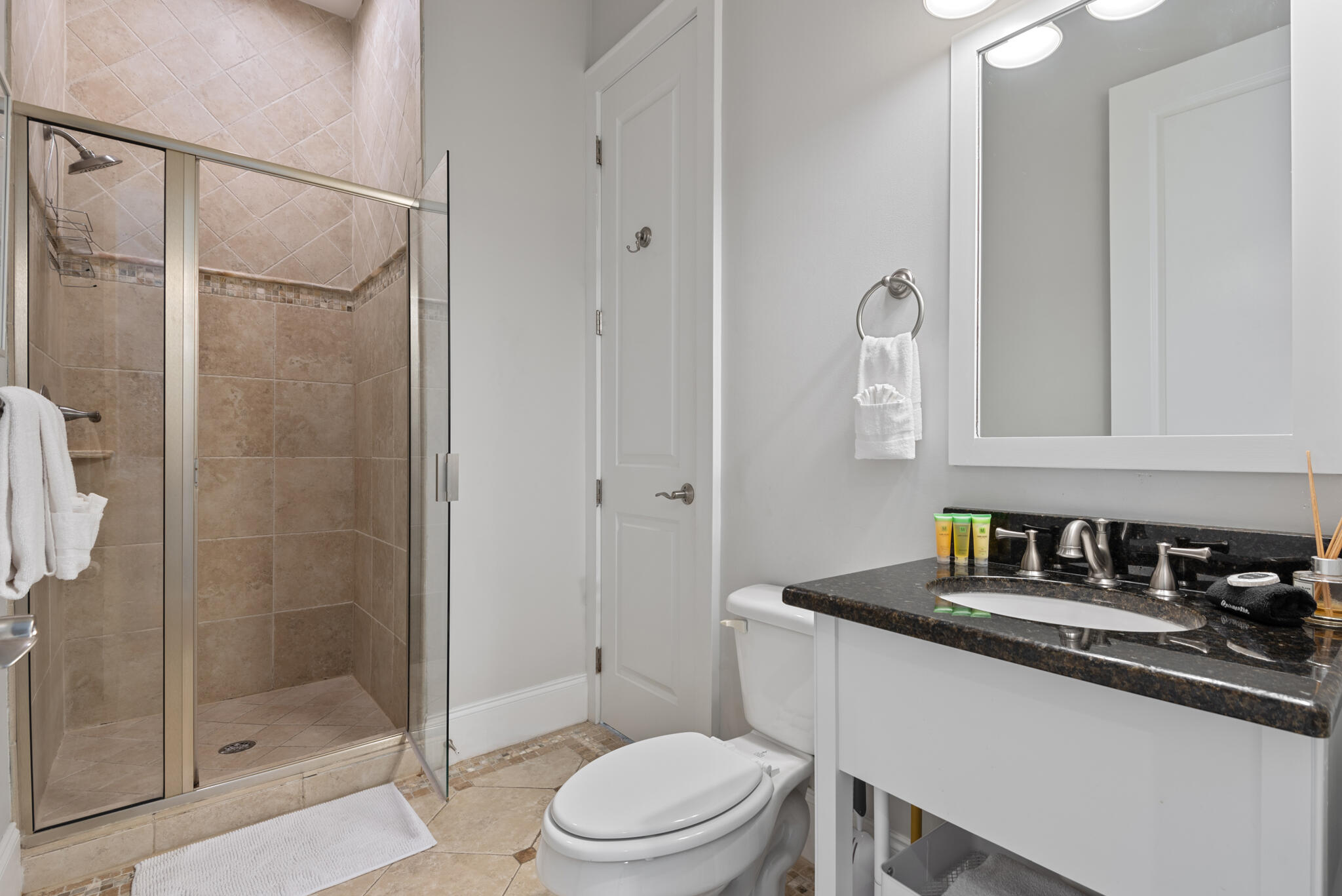 29 Coastal Grove Way, Unit 2 Santa Rosa Beach, FL 32459 - Photo 18 of 56 a bathroom with a granite countertop sink a toilet and shower