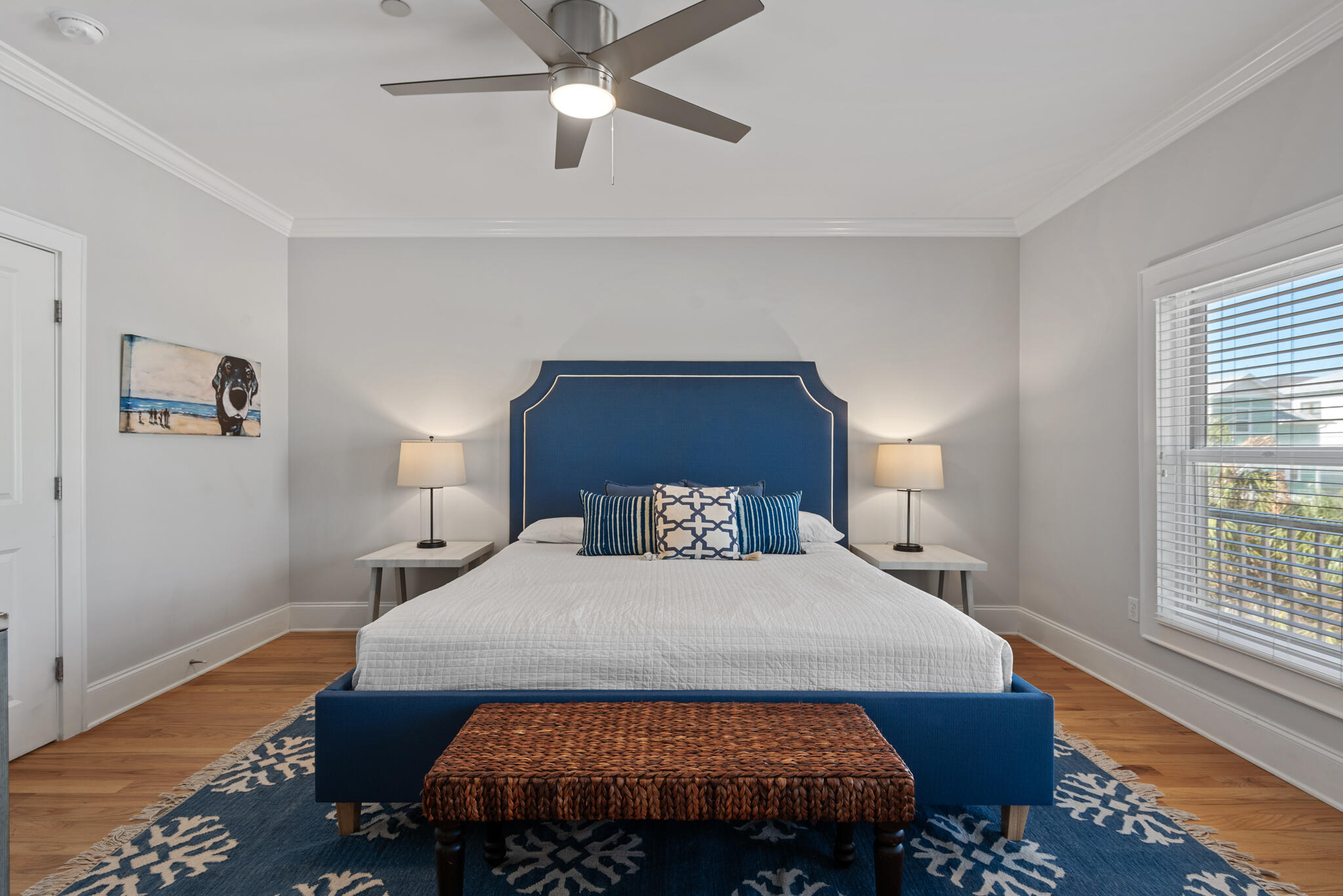 29 Coastal Grove Way, Unit 2 Santa Rosa Beach, FL 32459 - Photo 25 of 56 a bedroom with a bed and wooden floor