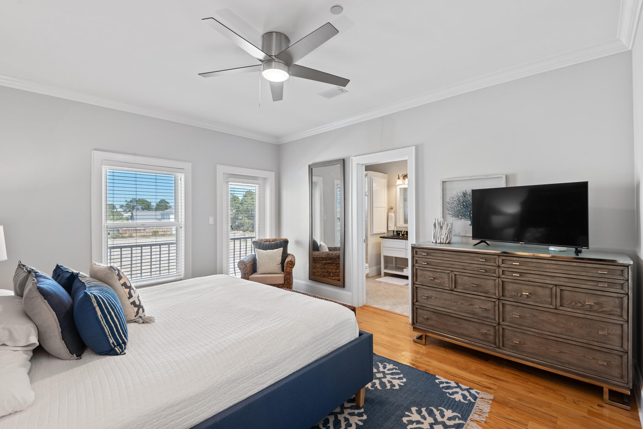 29 Coastal Grove Way, Unit 2 Santa Rosa Beach, FL 32459 - Photo 27 of 56 a bedroom with a bed and a flat screen television