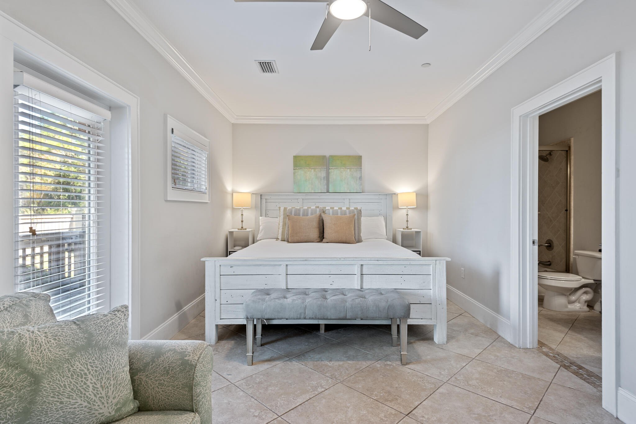 29 Coastal Grove Way, Unit 2 Santa Rosa Beach, FL 32459 - Photo 30 of 56 a bedroom with a bed and a couch