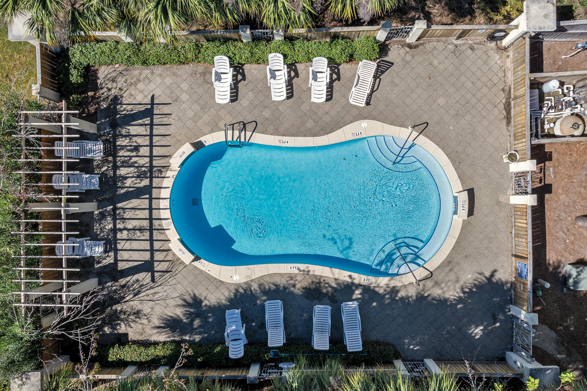 29 Coastal Grove Way, Unit 2 Santa Rosa Beach, FL 32459 - Photo 49 of 56 a picture of a table and chairs with wooden floor
