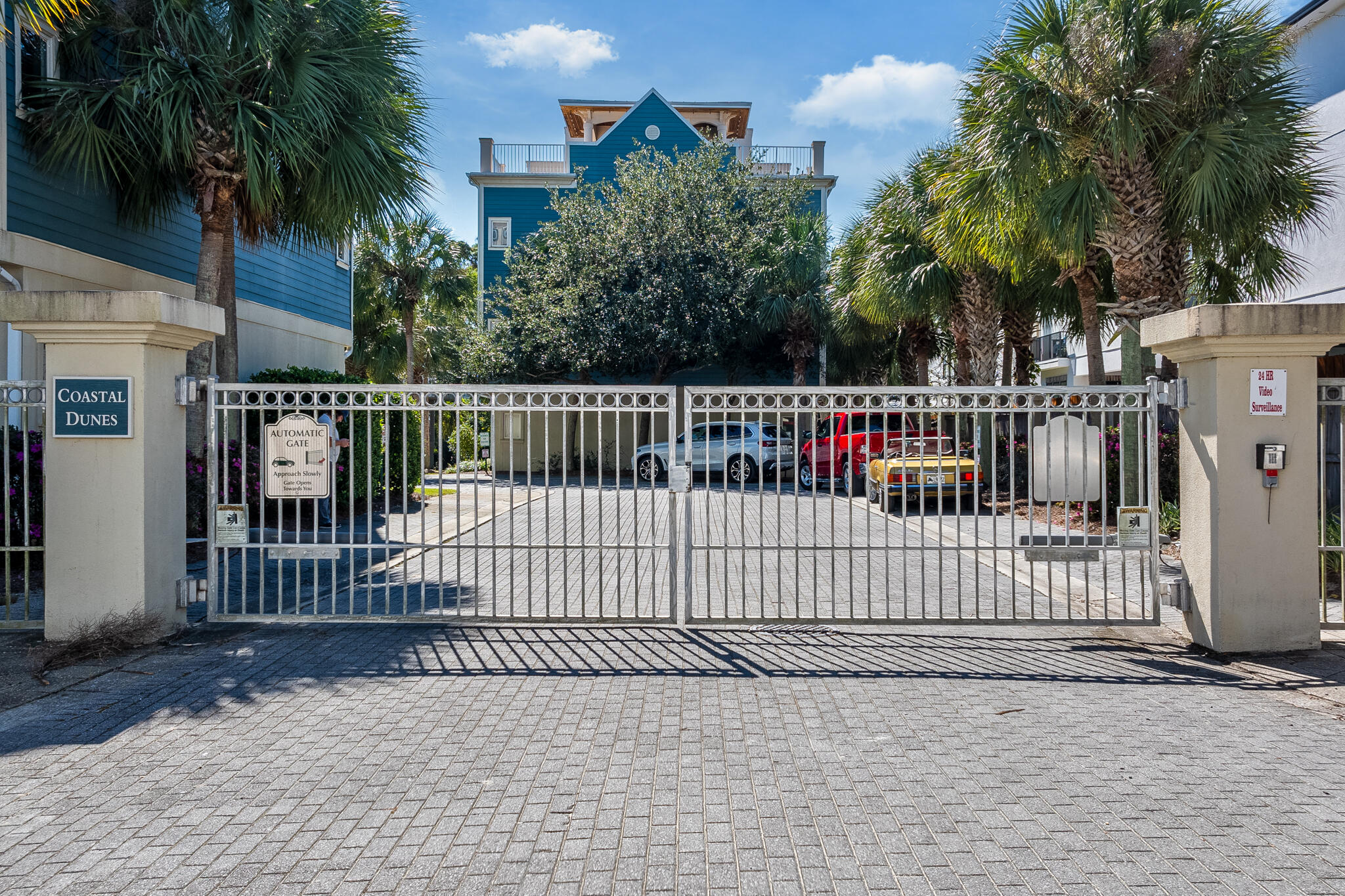 29 Coastal Grove Way, Unit 2 Santa Rosa Beach, FL 32459 - Photo 56 of 56 a view of a brick house with a wooden fence