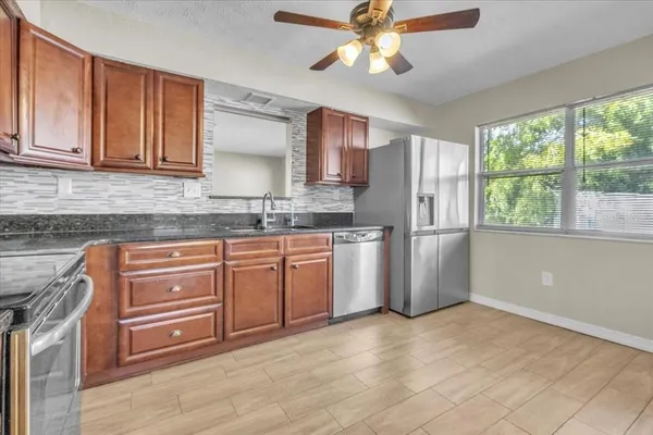 a view of a kitchen from the hallway