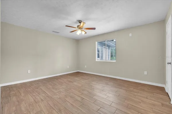 a bathroom with a shower and a toilet