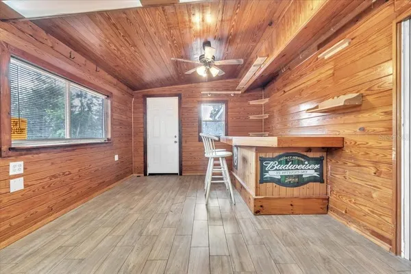 a view of small house with a outdoor space