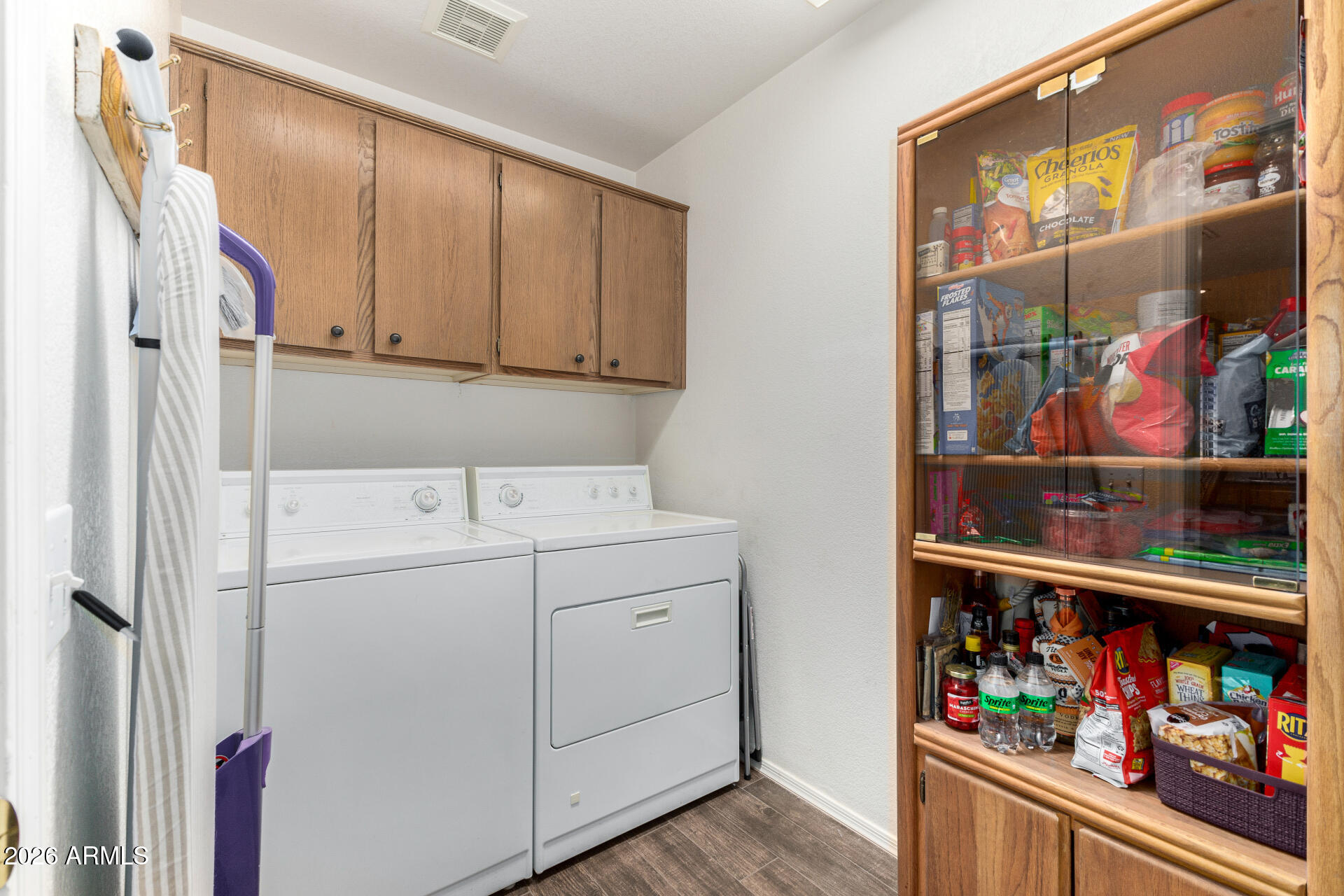 15764 Piccadilly Road Goodyear, AZ 85395 - Photo 14 of 31 a utility room with dryer and washer