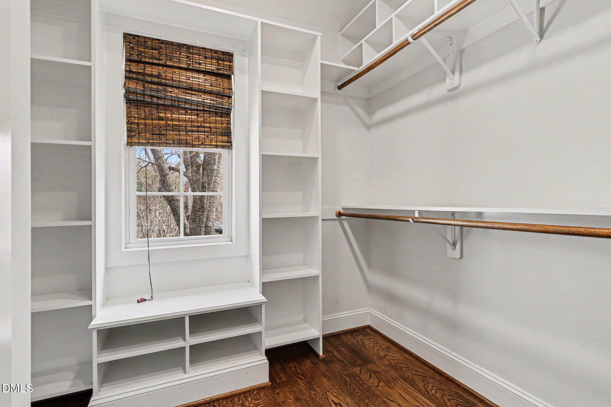 227 Furches Street Raleigh, NC 27607 - Photo 19 of 26 a view of walk in closet with empty racks