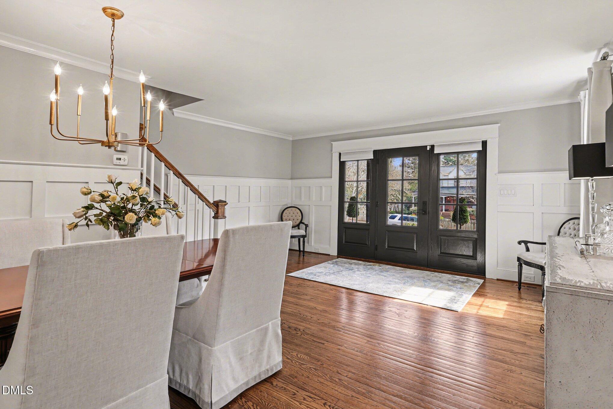 227 Furches Street Raleigh, NC 27607 - Photo 5 of 26 a view of a livingroom with furniture wooden floor and windows