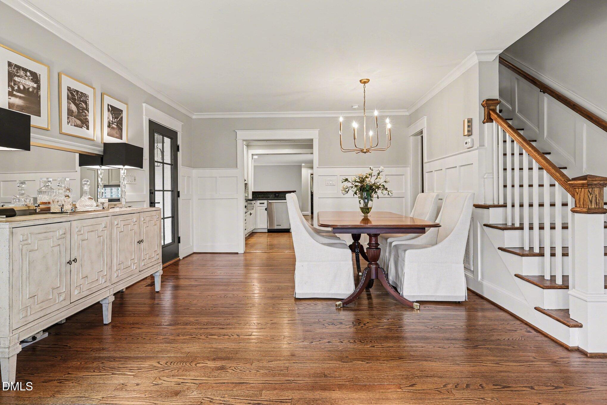 227 Furches Street Raleigh, NC 27607 - Photo 8 of 26 a view of kitchen and dining room with wooden floor