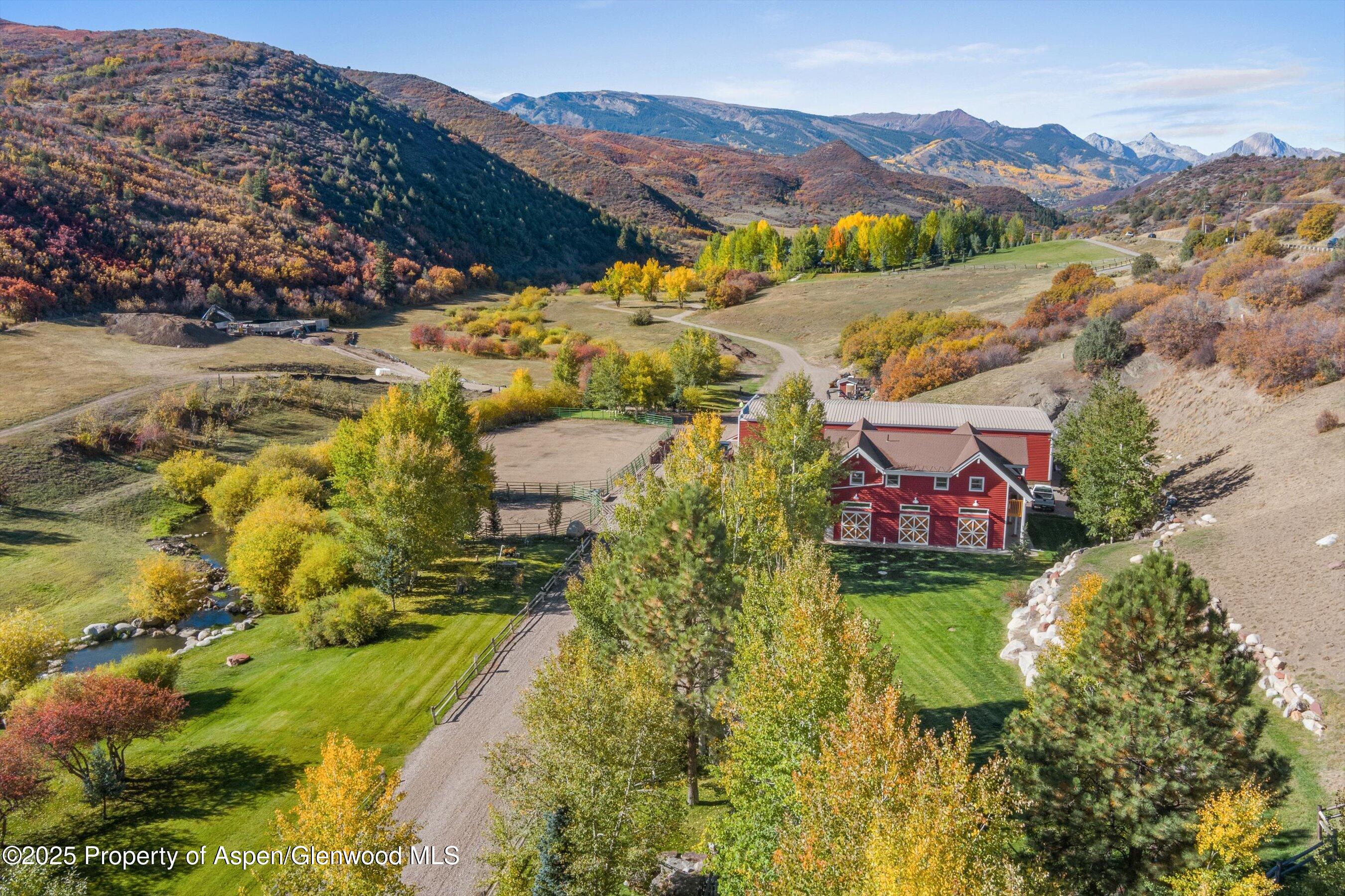 660 Brush Creek Road Aspen, CO 81611 - Photo 15 of 27 an aerial view of residential houses with outdoor space