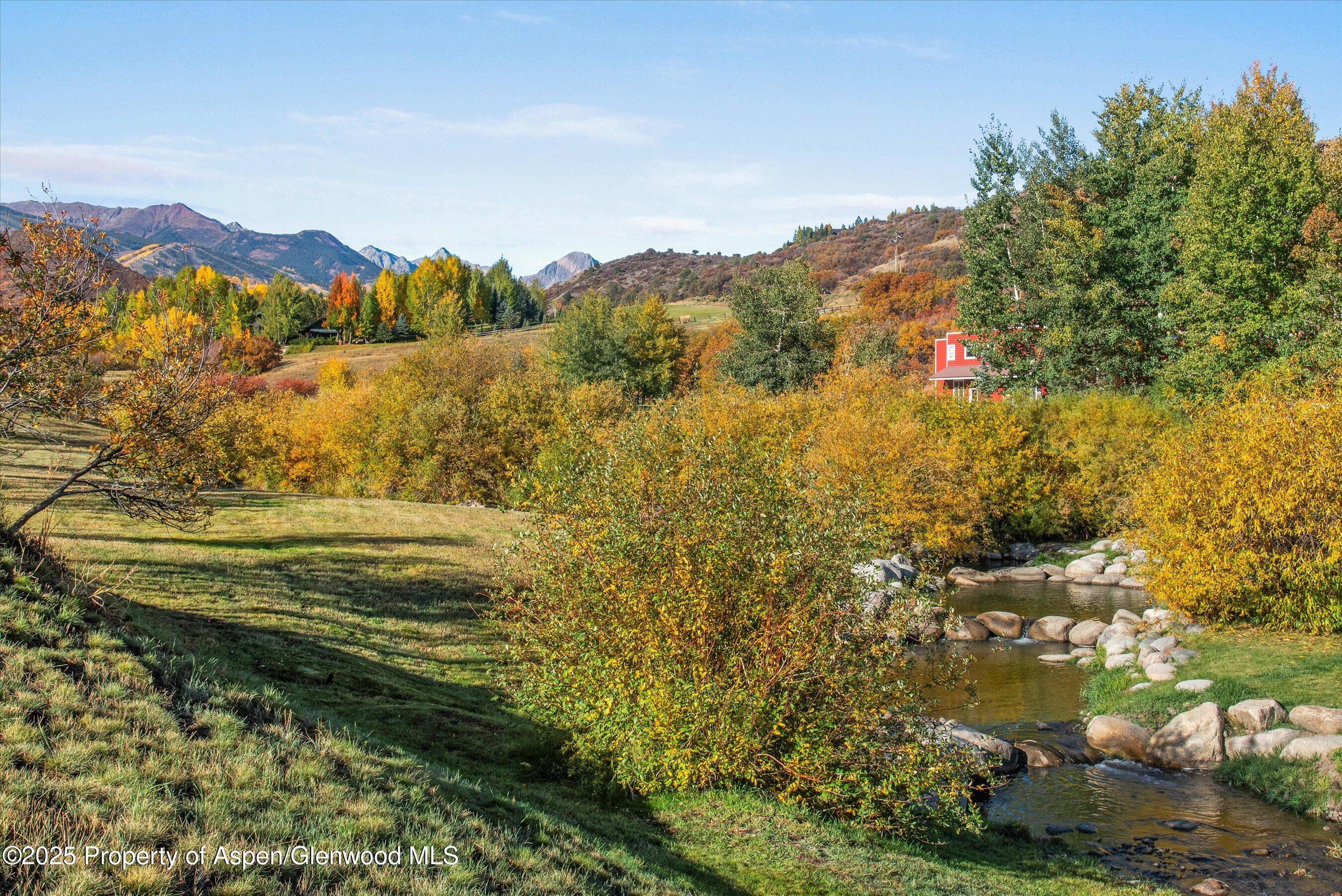 660 Brush Creek Road Aspen, CO 81611 - Photo 6 of 27 a view of lake and mountain