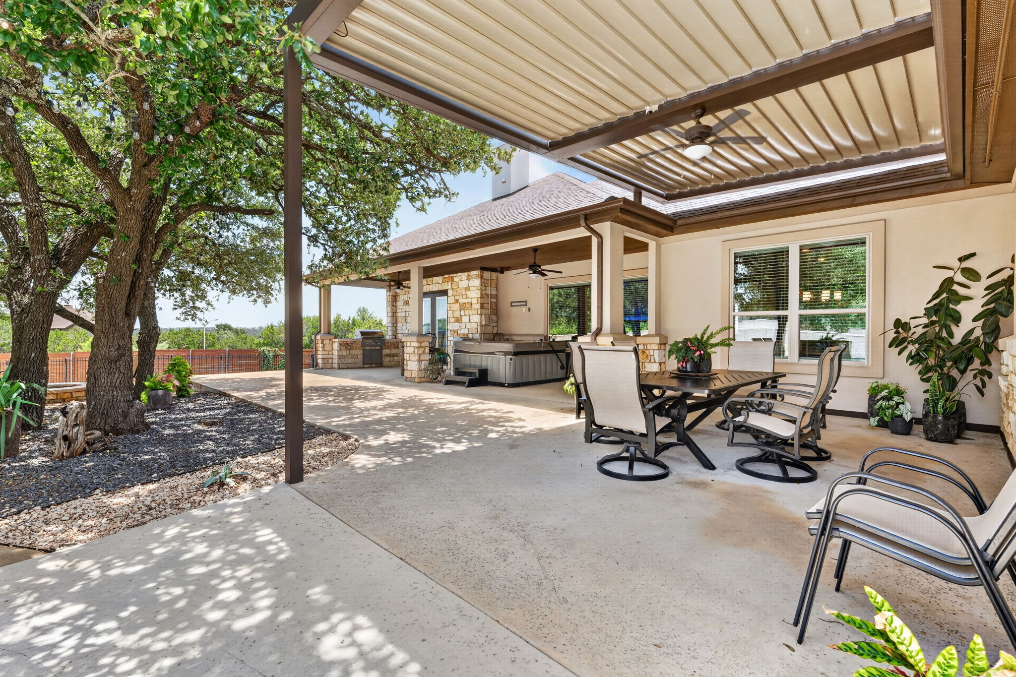 105 Coopers Hill Road Georgetown, TX 78633 - Photo 33 of 40 a view of a backyard with sitting area