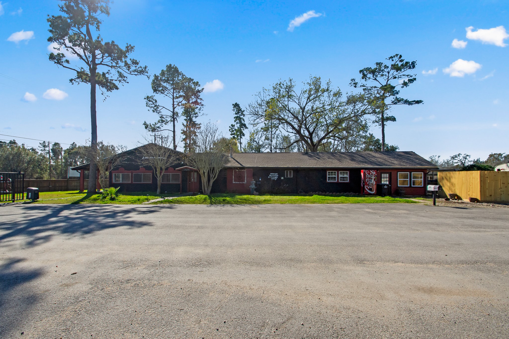 6830 South Highway 35 Alvin, TX 77511 - Photo 22 of 24 a view of a house with swimming pool and a yard