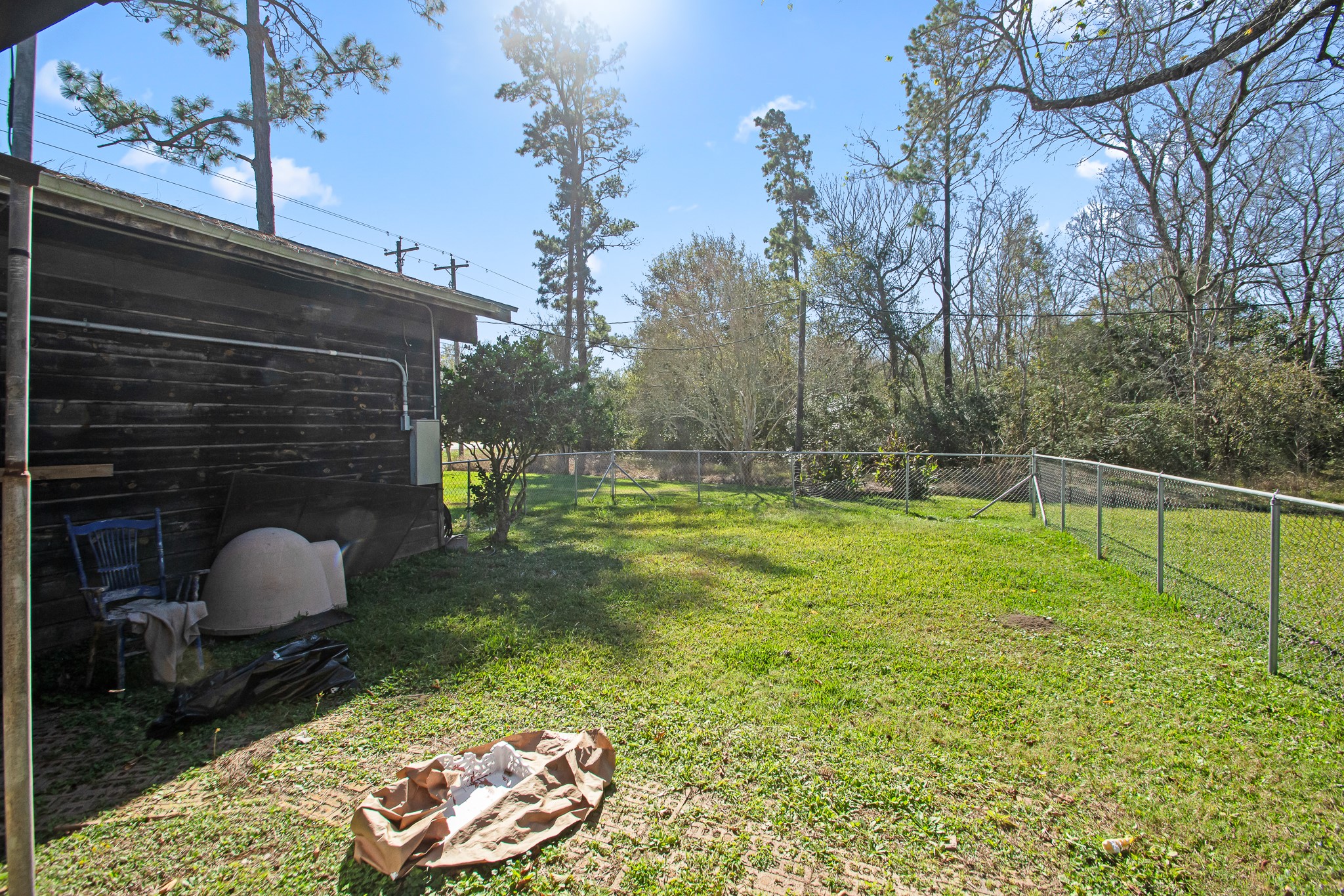 6830 South Highway 35 Alvin, TX 77511 - Photo 8 of 24 a backyard of a house with table and chairs