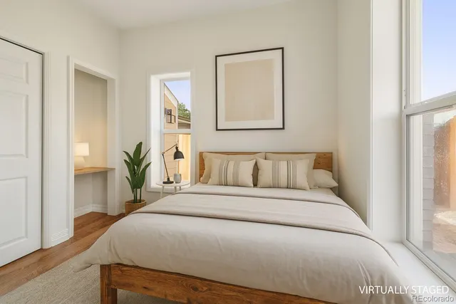 a large white bed in a white room